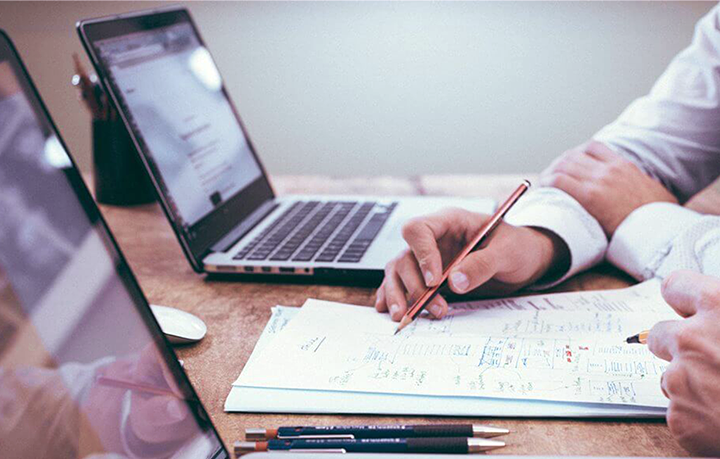 Business man in front of laptop